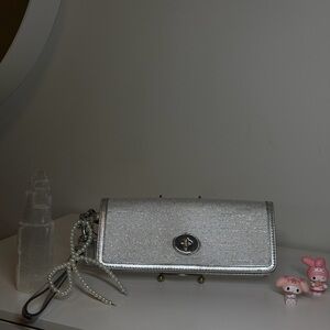 Y2K coach shimmer clutch